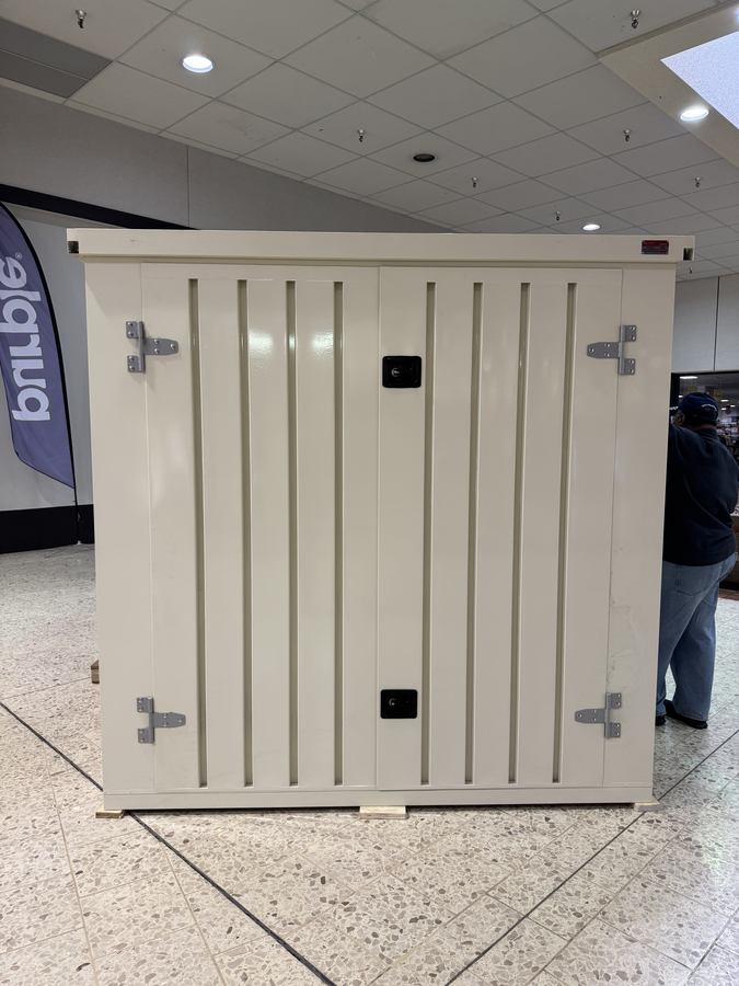 Oyster-colored storage vault displayed indoors