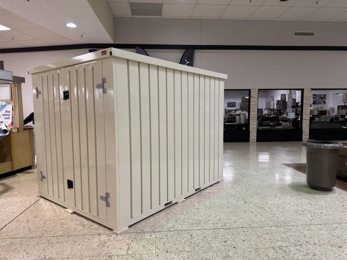 Oyster-colored steel storage vault on display