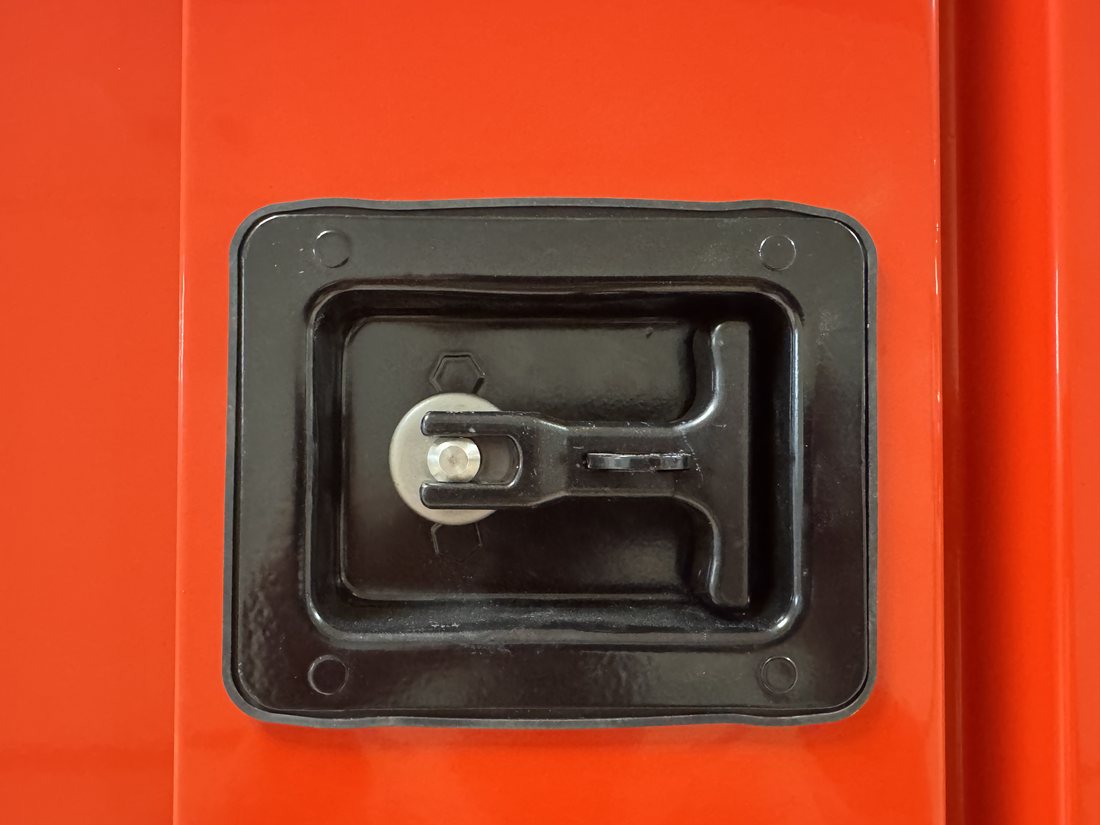 Recessed T-handle paddle latch on a My Yard Vault 4 Corners door