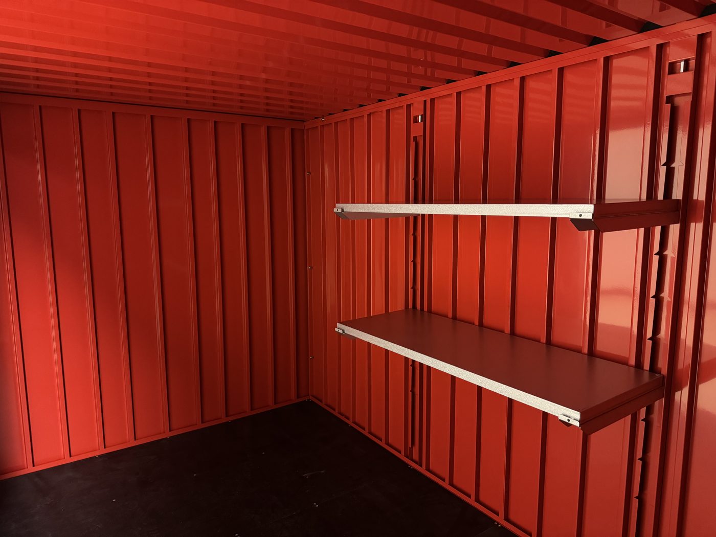 Steel shelving installed inside a My Yard Vault 4 Corners unit