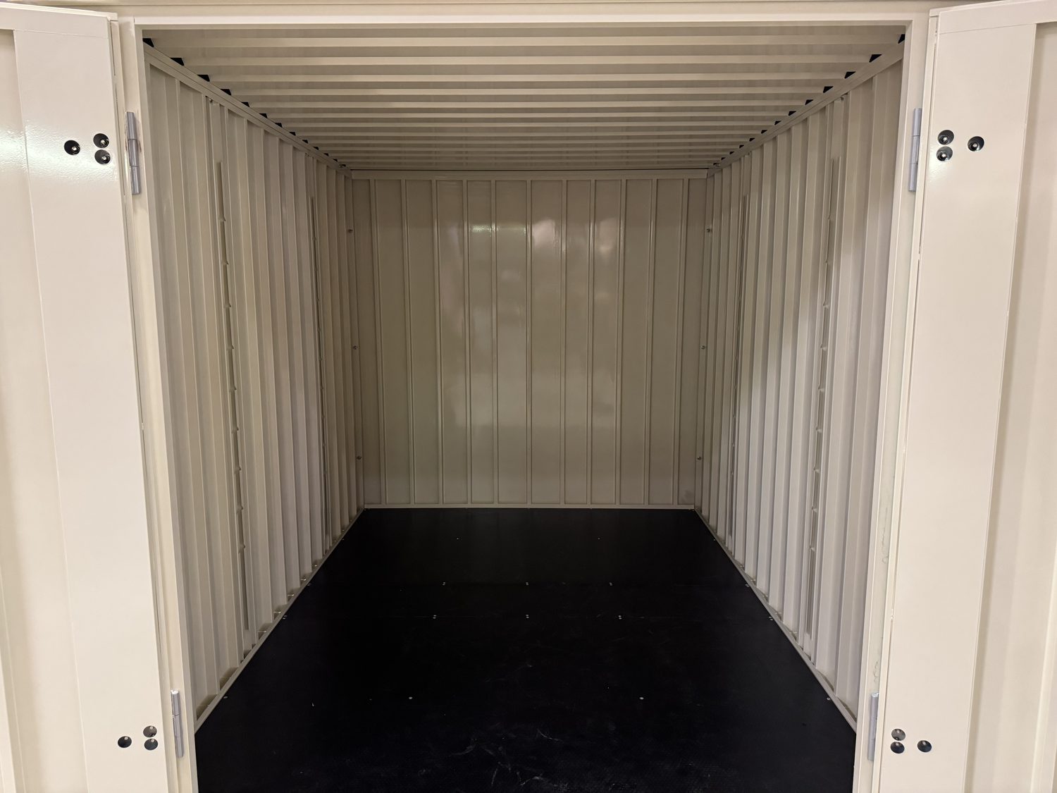 Straight in through the double doors, flat floor, full standing height, nothing in the way.