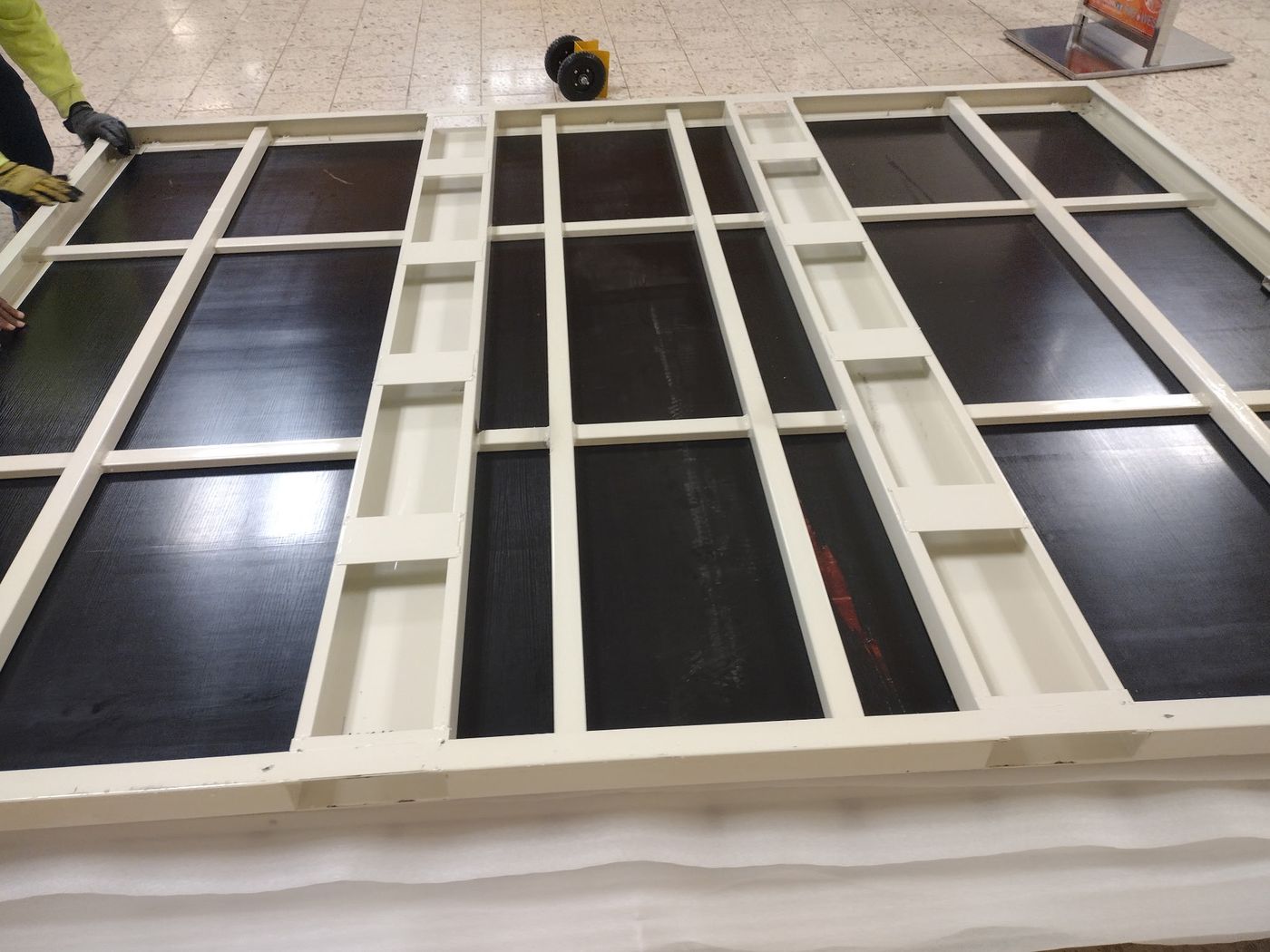 The reinforced steel floor frame, marine-board decked.