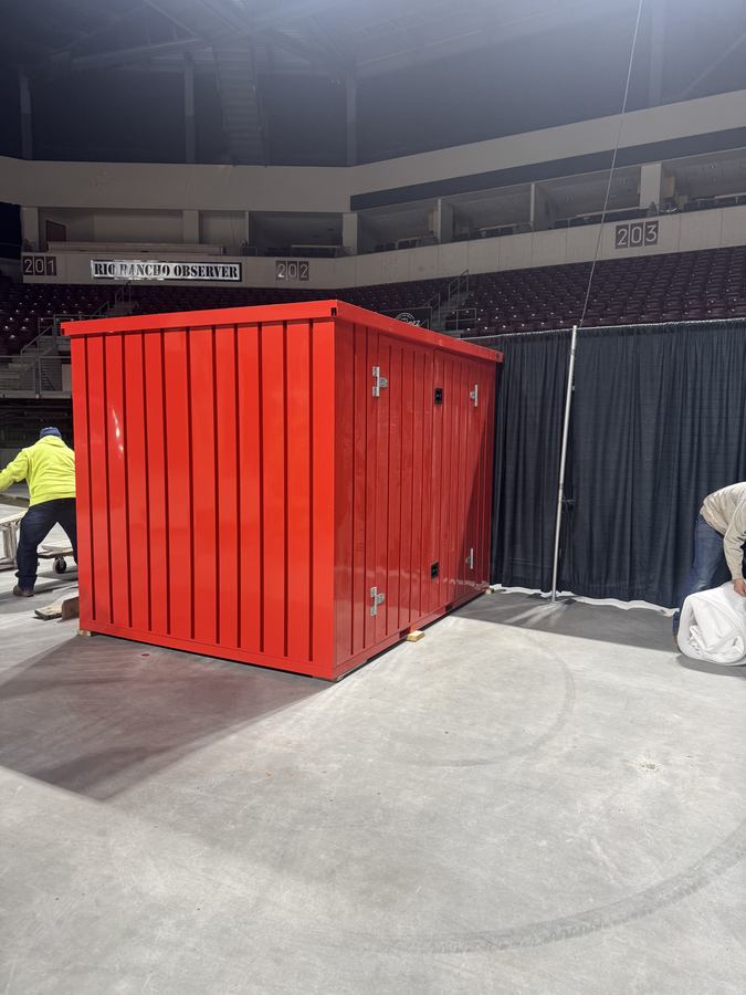 Steel storage units displayed at a home show