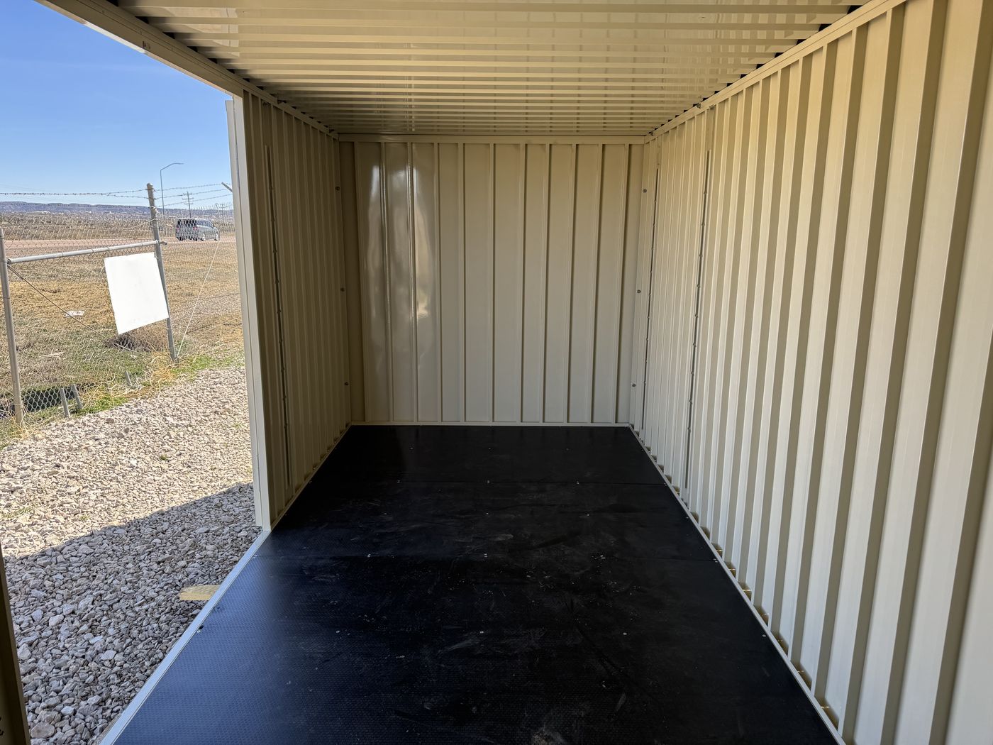 Oyster interior, bright, sealed, and walk-in.