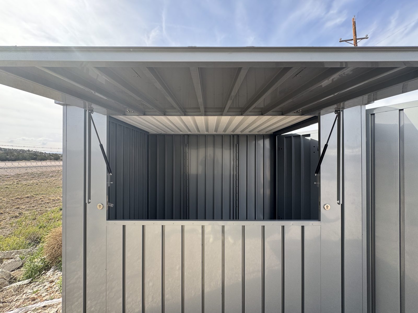 Flat-pack kiosk with its serving window open for business